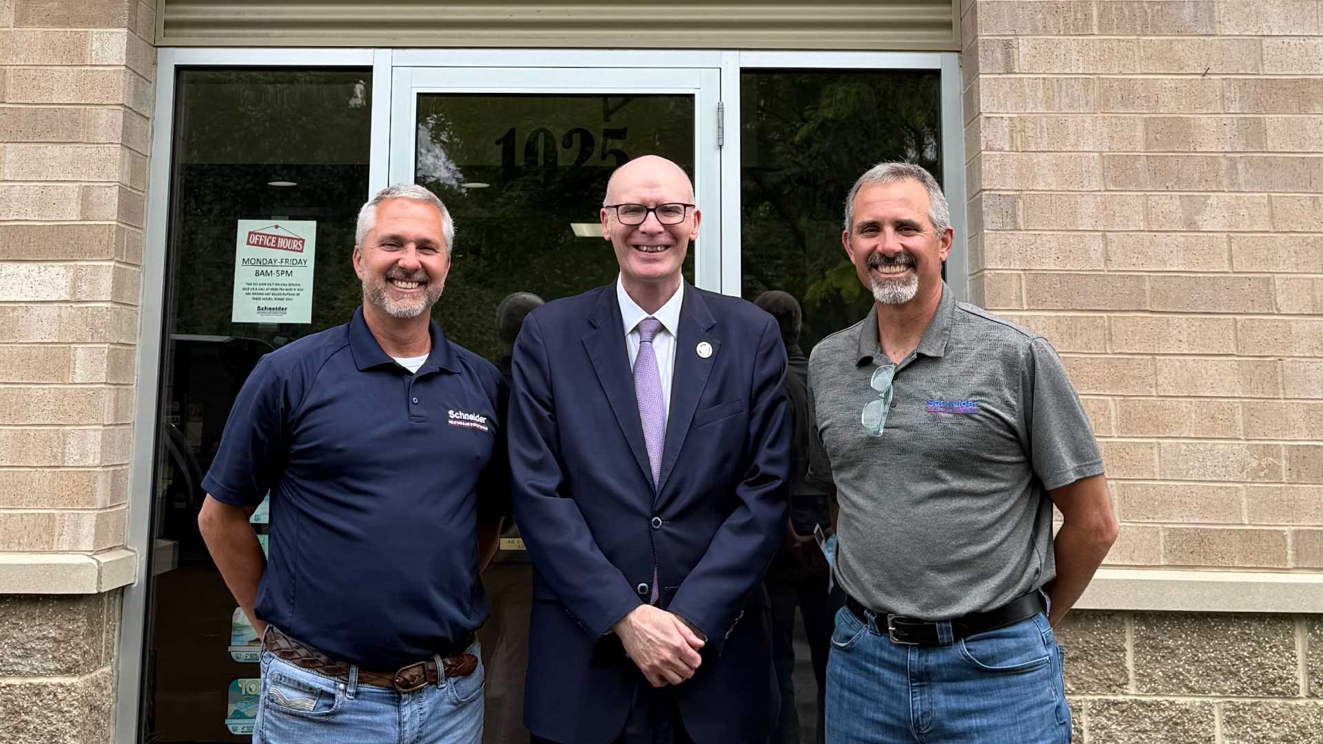 Chancellor James Beeby visits Scheider Heating & Air Conditioning Co-owners, Rick & Mark Scheider.