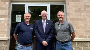Chancellor James Beeby visits Scheider Heating & Air Conditioning Co-owners, Rick & Mark Scheider.
