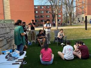 Group of AERIE students visiting at an AERIE S'mores Event